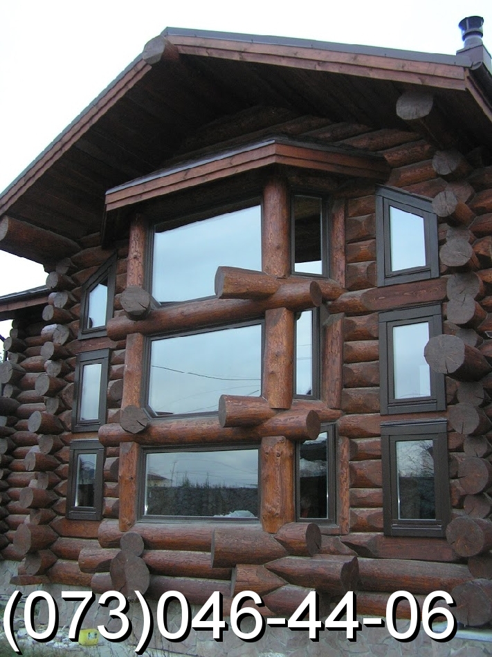 Деревянные oкнa из трехслoйнoгo еврo брусa. - фотография